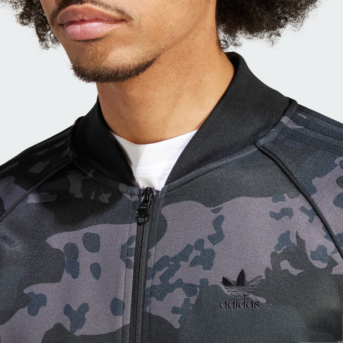 Adidas Camo SSTR Track Top. 7