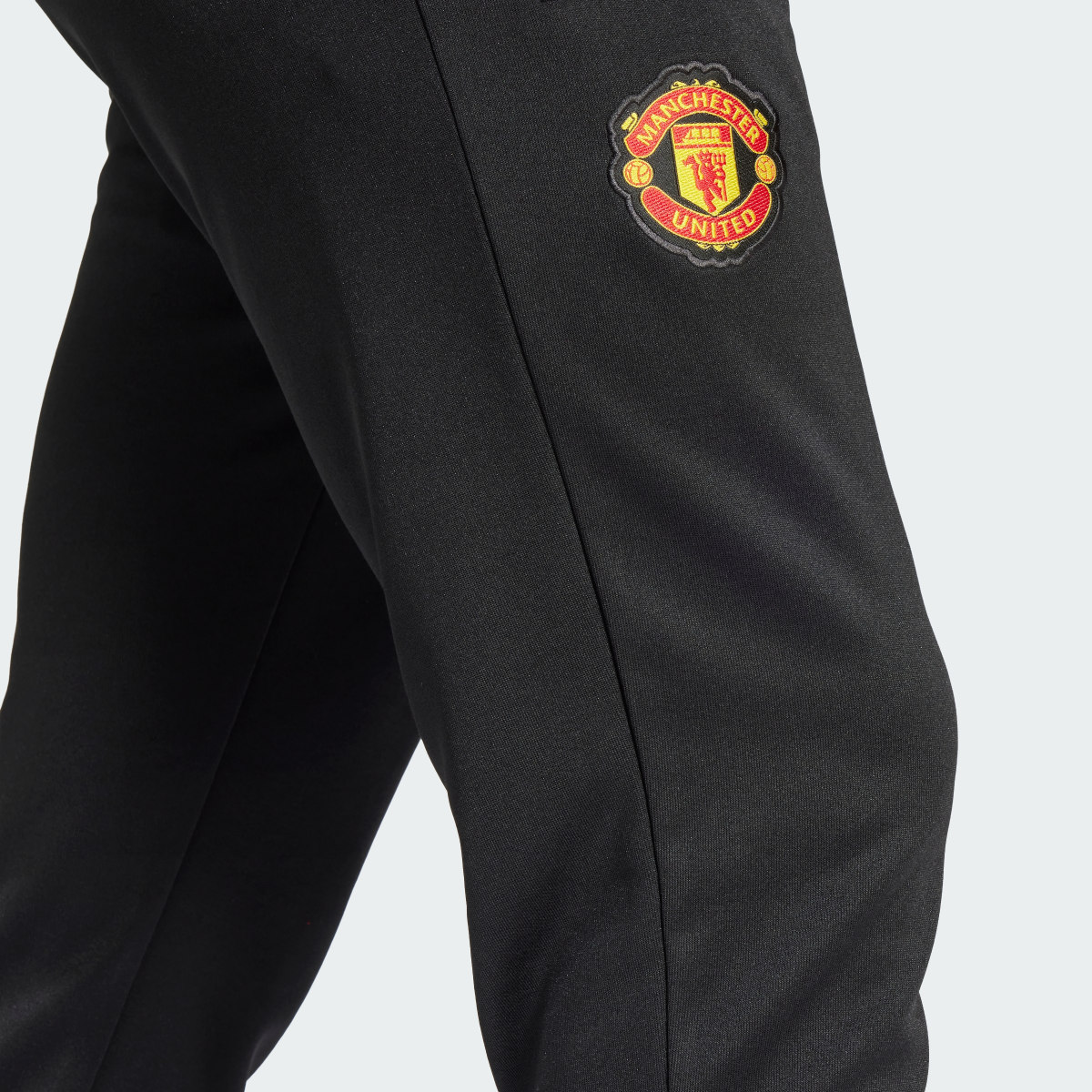 Adidas Manchester United Essentials Trefoil Track Pants. 5