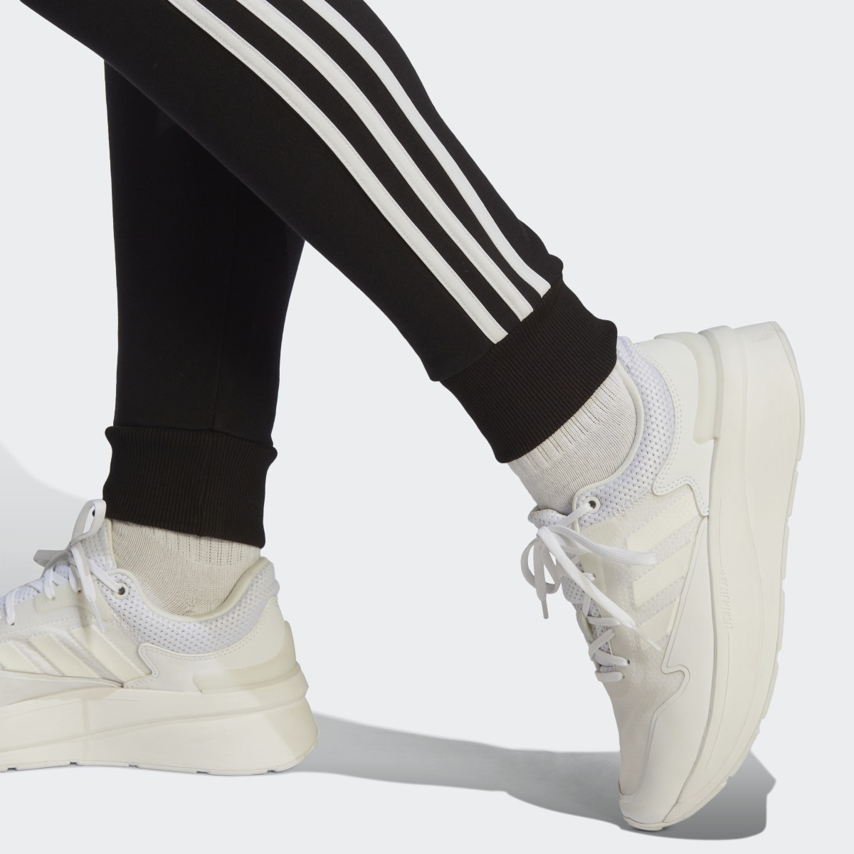 Adidas Essentials 3-Stripes French Terry Cuffed Joggers. 7
