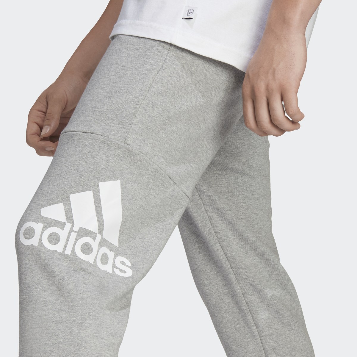 Adidas Essentials French Terry Tapered Cuff Logo Hose. 5