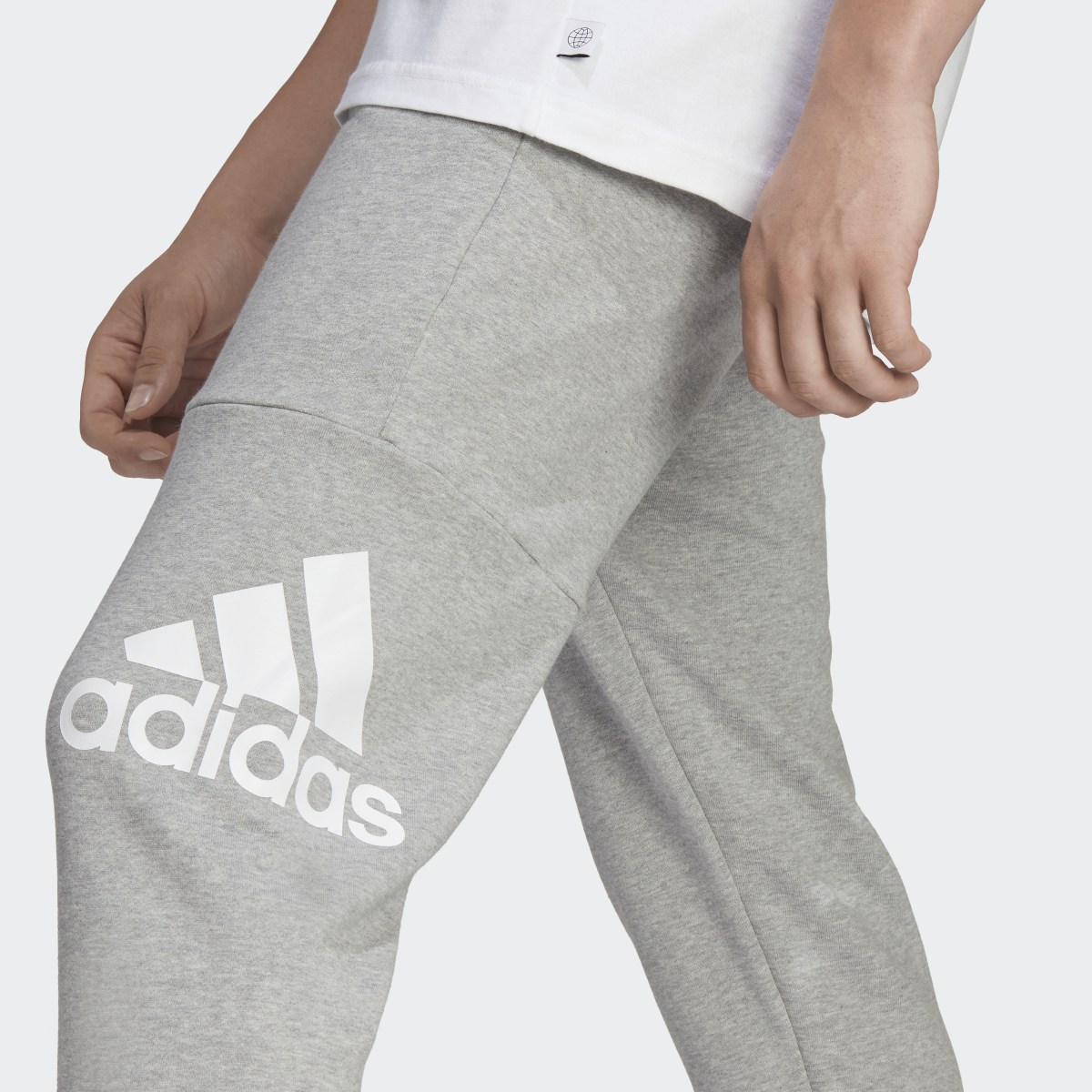 Adidas Essentials French Terry Tapered Cuff Logo Joggers. 5