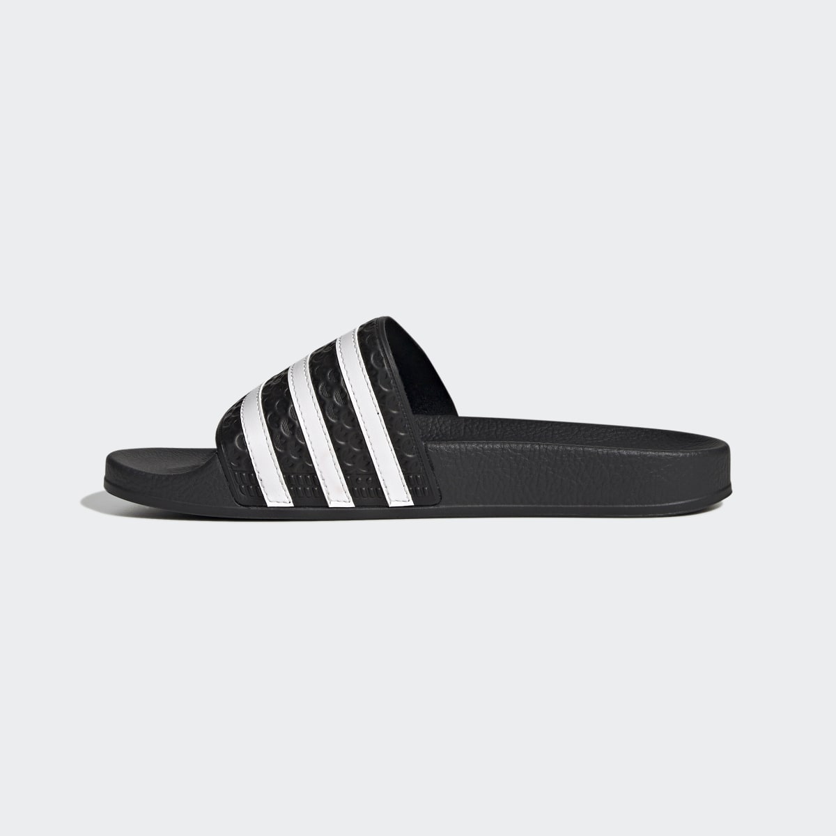 Adidas Adilette Slides. 7