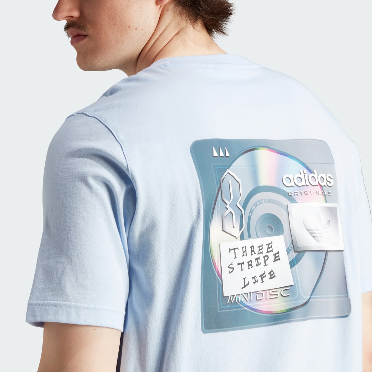 Adidas Mini Disc Back Graphic Tee. 7