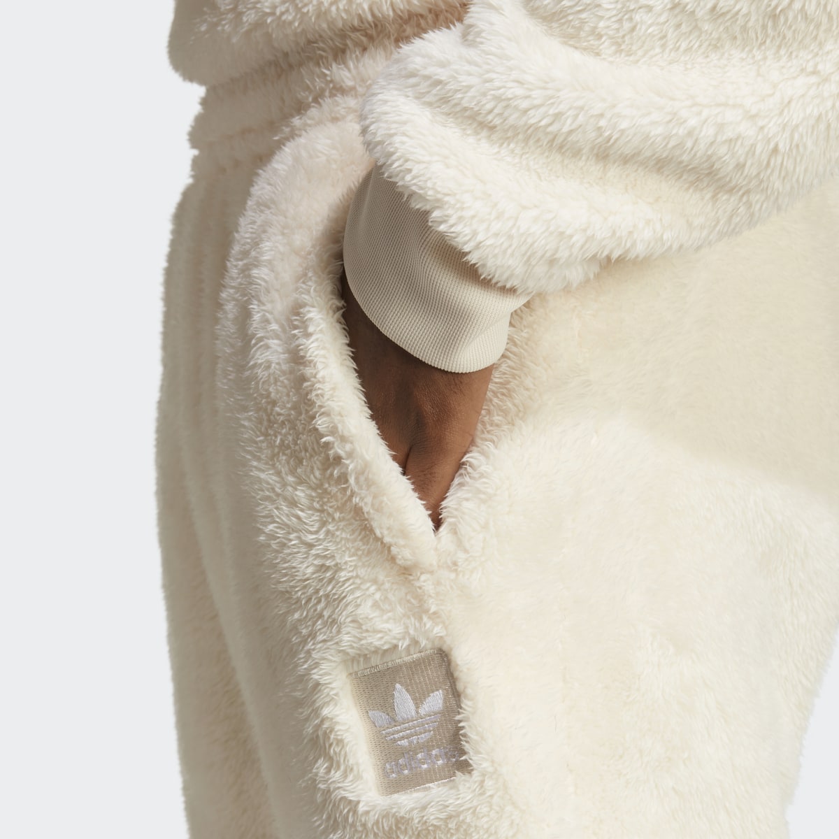 Adidas Essentials+ Fluffy Fleece Joggers. 6