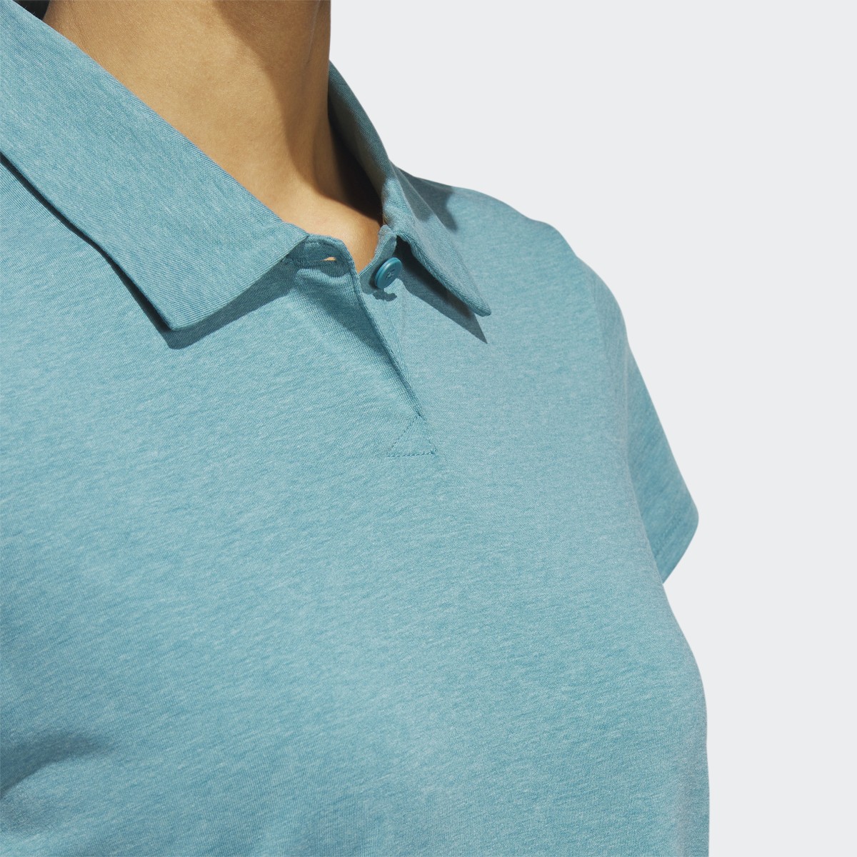 Adidas Go-To Heathered Golf Polo Shirt. 7