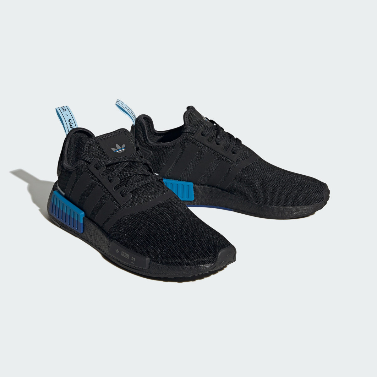 Adidas Tenis NMD_R1. 5