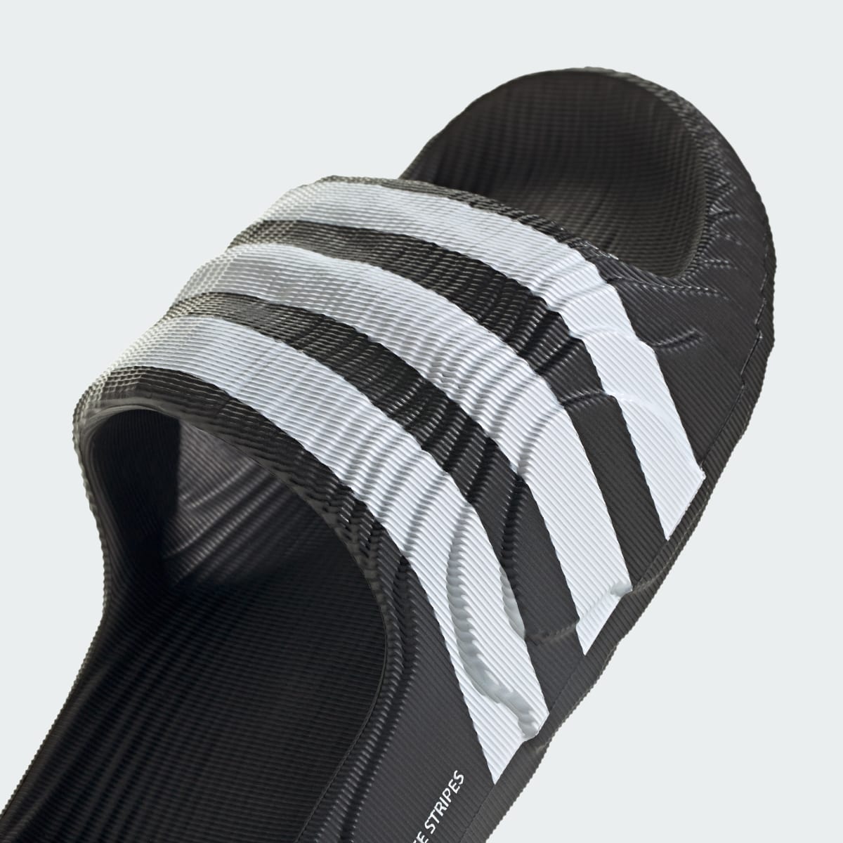 Adidas Chancla Adilette 22. 9