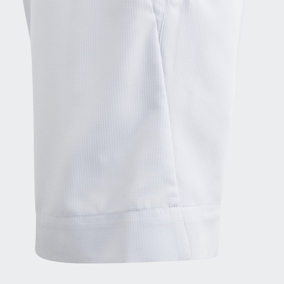 Adidas Short tissé ajustable City Escape Casual. 6