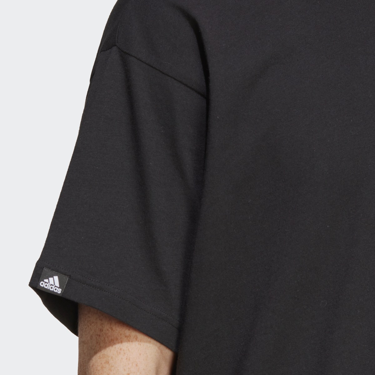 Adidas Graphic T-Shirt. 6