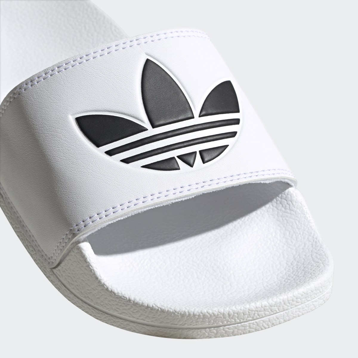 Adidas Adilette Lite Slides. 10