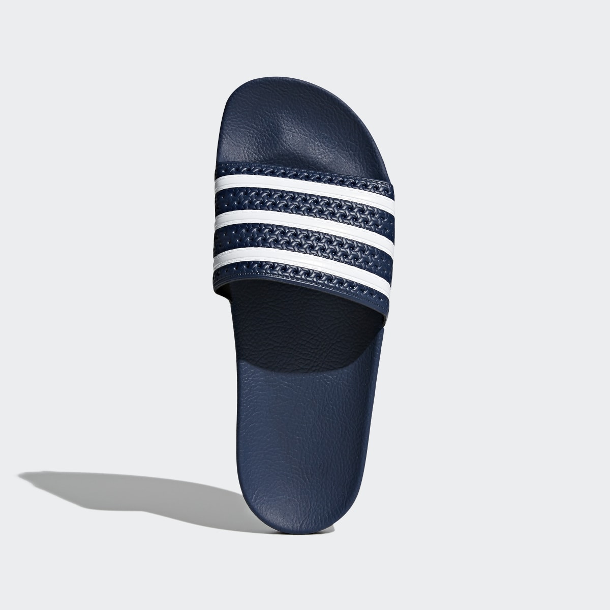 Adidas Adilette. 4