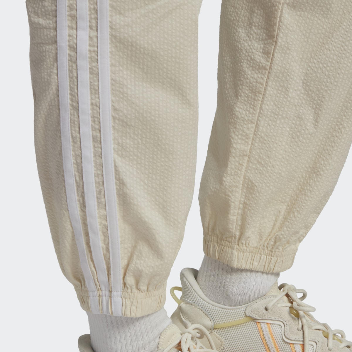 Adidas Pantalon de survêtement en popeline Adicolor Classics. 7