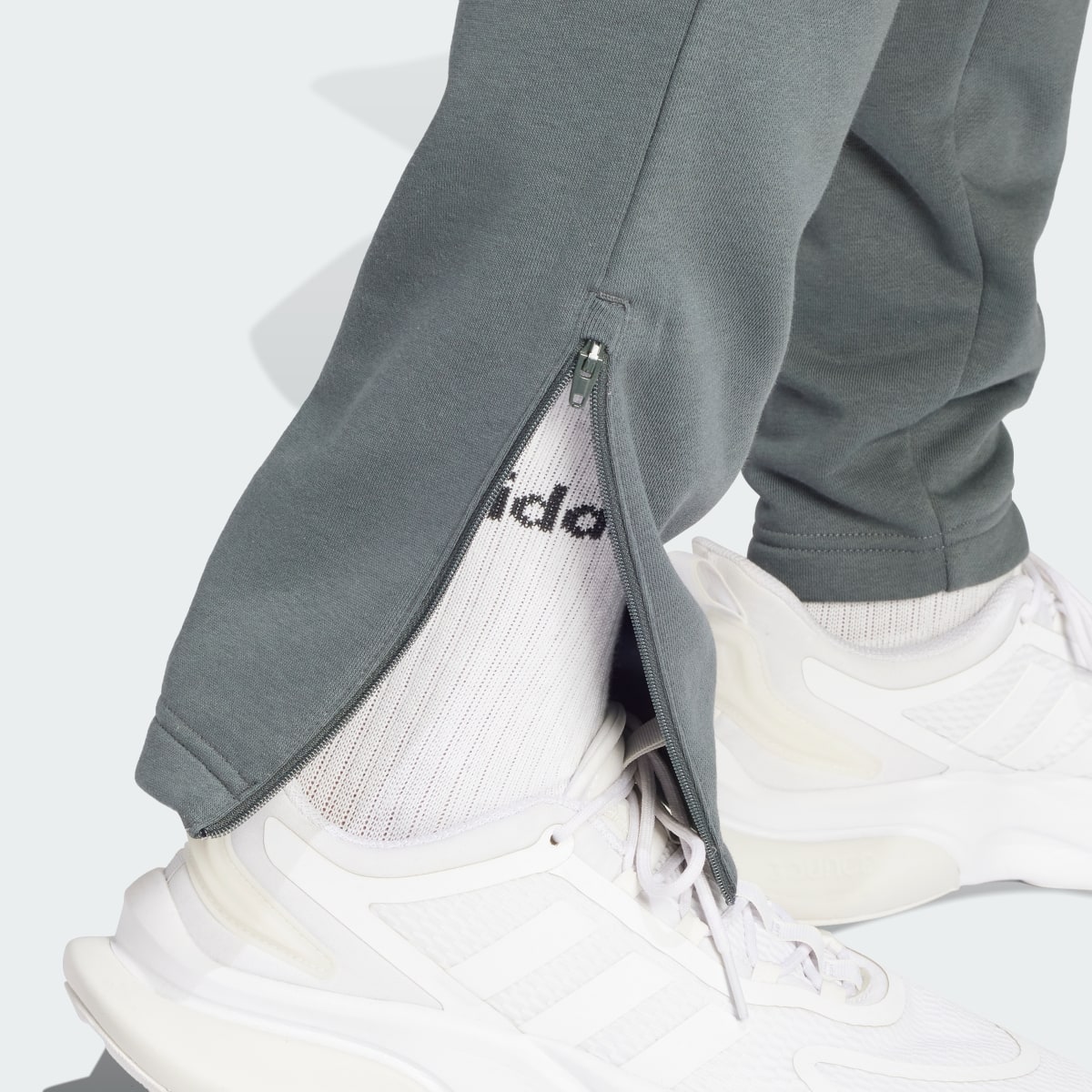 Adidas ALL SZN Fleece Tapered Leg Zip Pants. 6