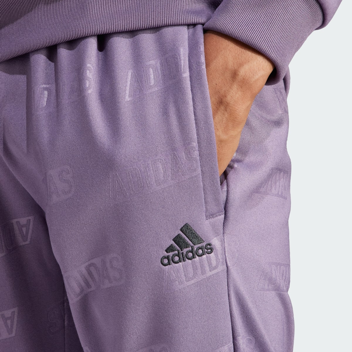 Adidas Embossed adidas Polar Fleece Tapered Pants. 5