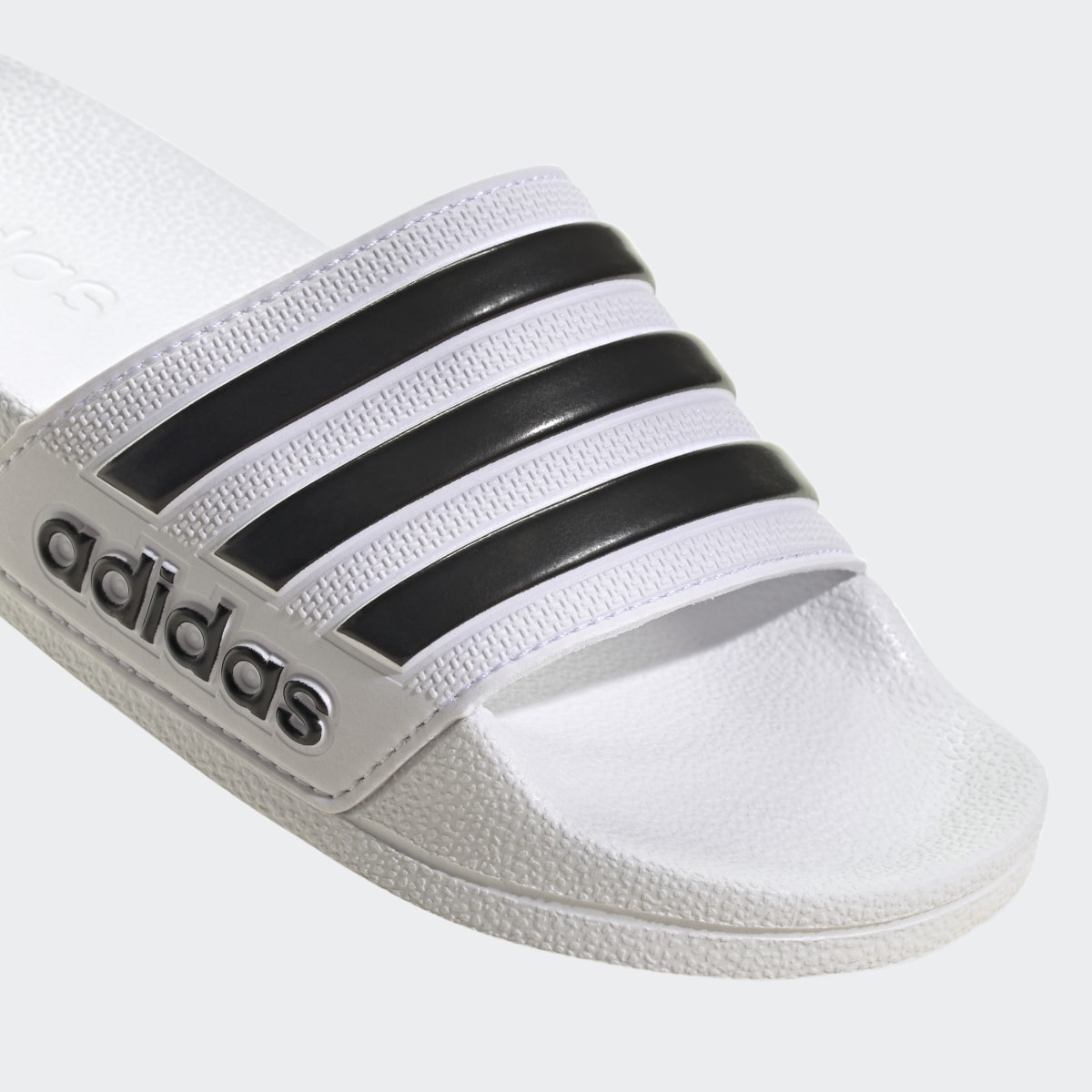 Adidas Adilette Shower Slides. 9