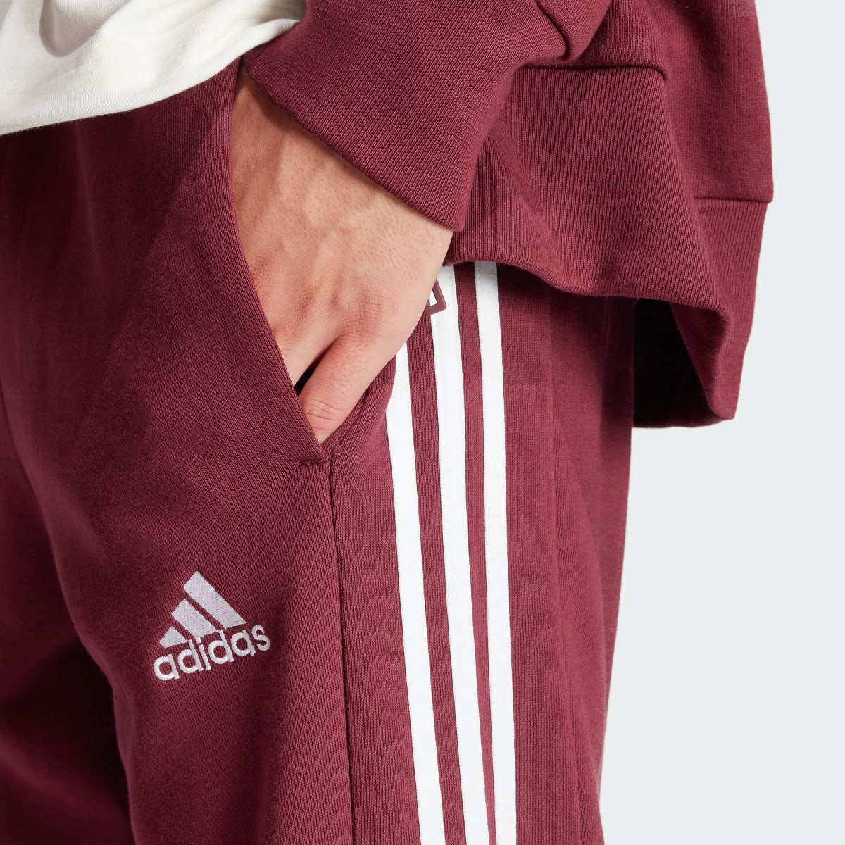 Adidas Pantalon fuselé en molleton Essentials Cuff 3-Stripes. 6