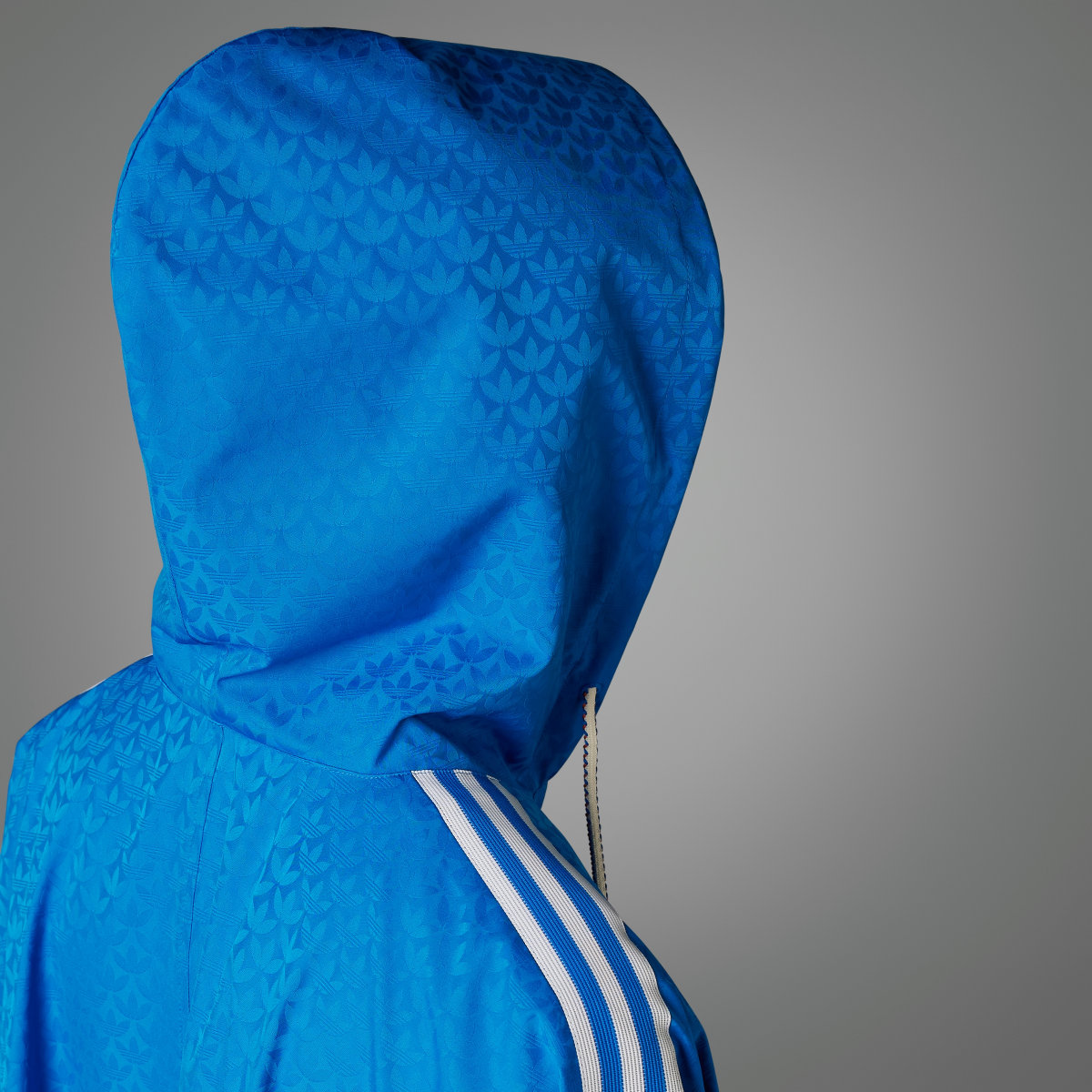 Adidas Adicolor 70s Monogram Poncho. 8 Adidas Adicolor 70s Monogram Poncho. 8