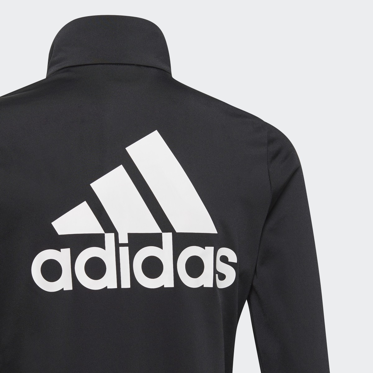 Adidas Essentials Tracksuit. 6