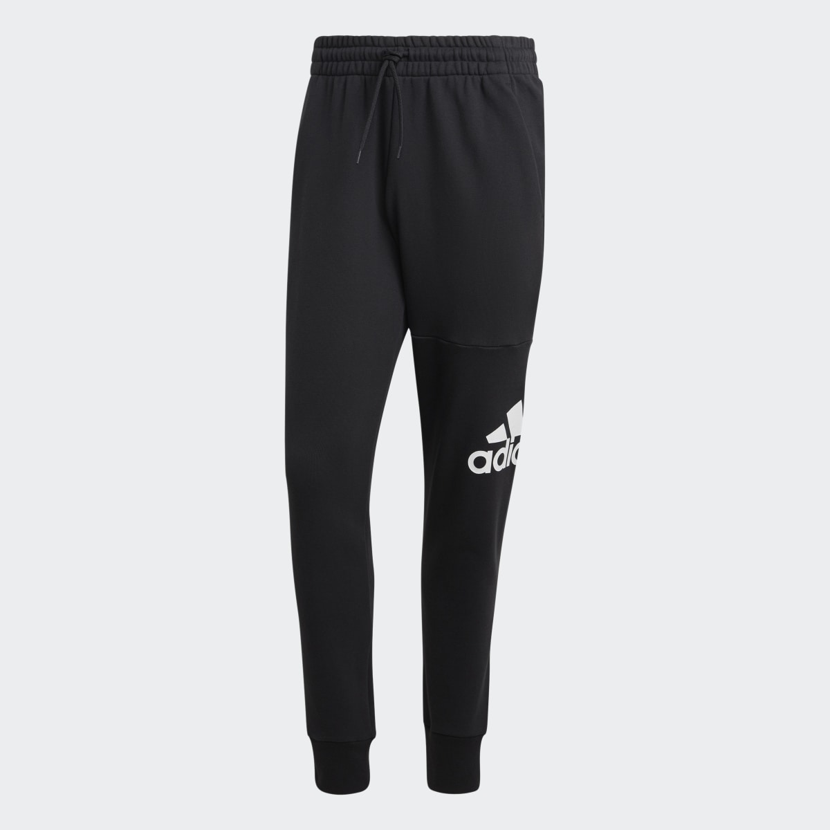 Adidas Essentials French Terry Tapered Cuff Logo Pants. 5