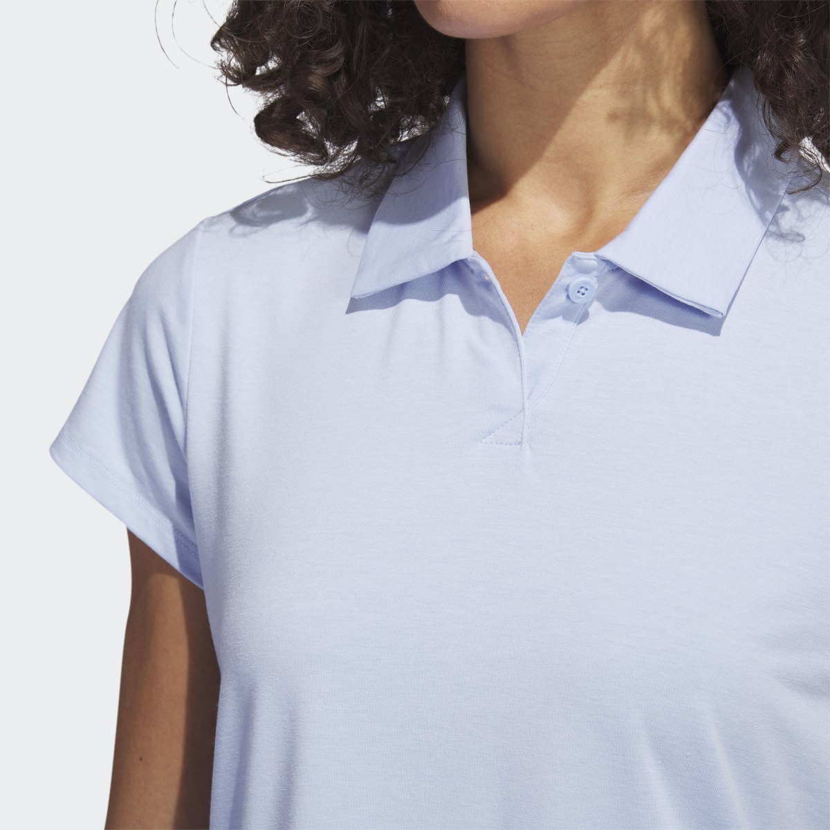 Adidas Playera Polo Go-To Heathered. 7