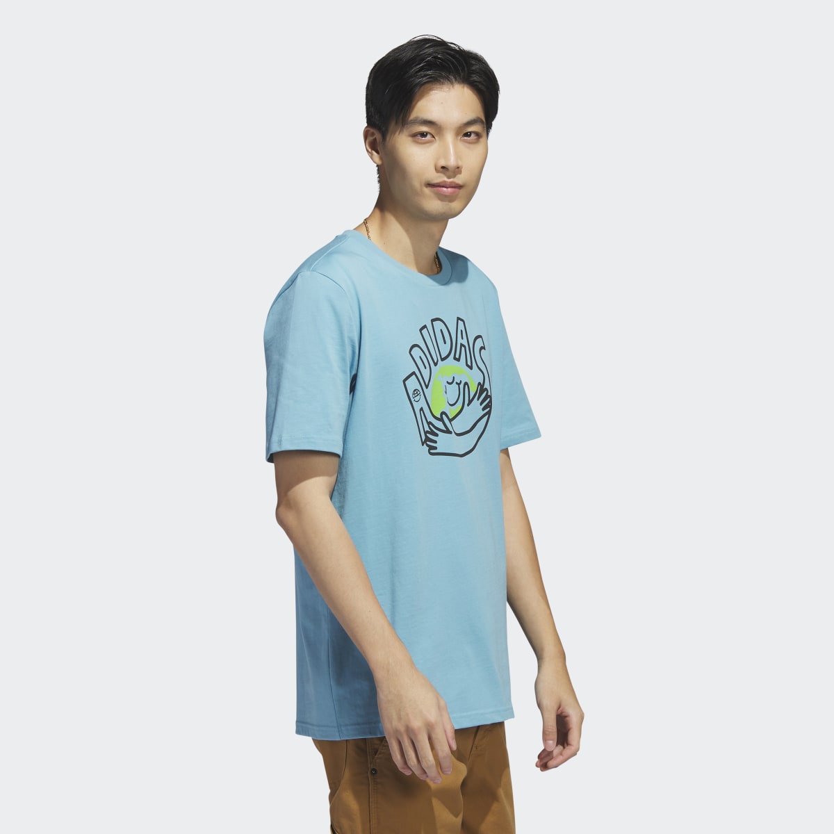 Adidas Change Through Sports Earth Graphic Tee. 4