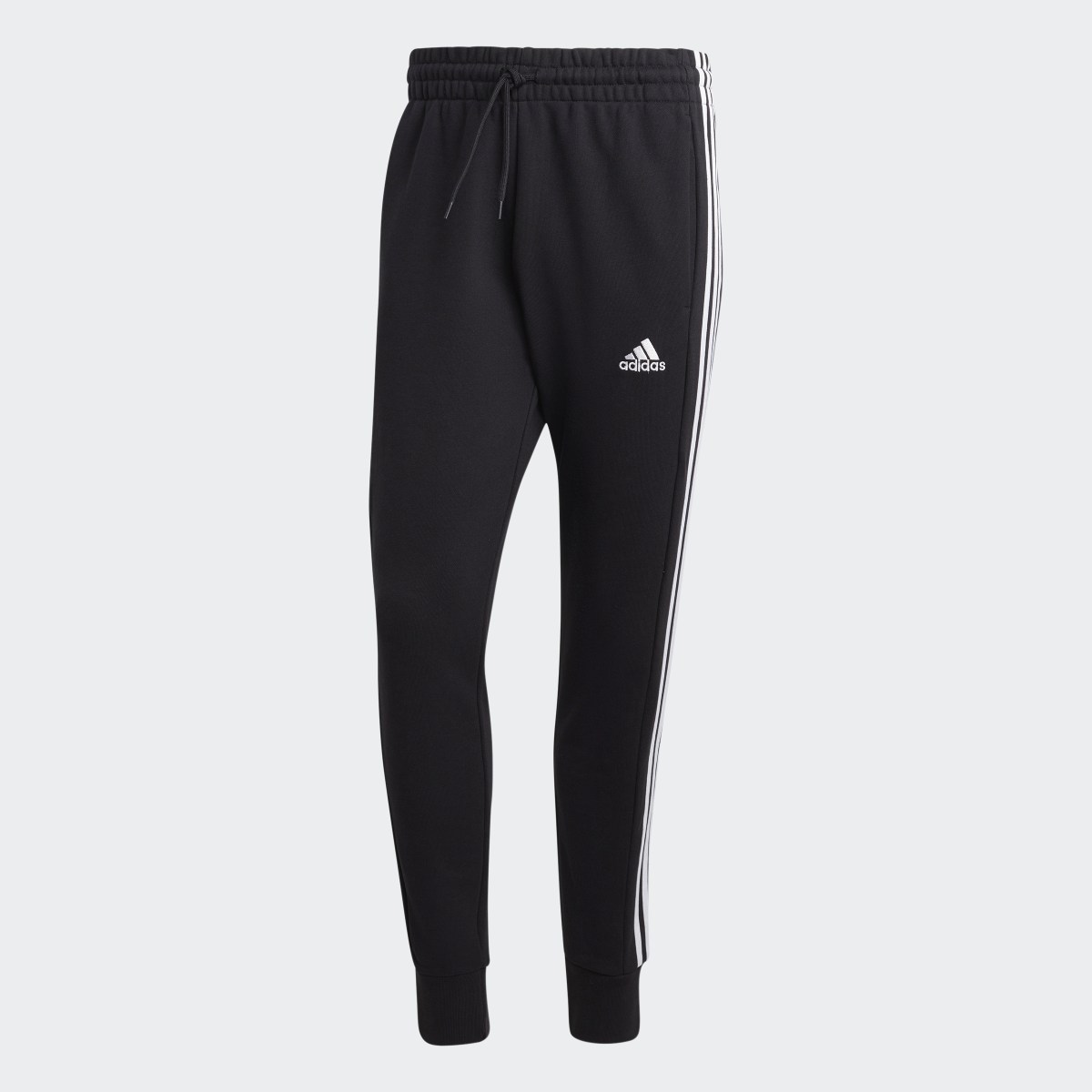 Adidas Essentials French Terry Tapered Cuff 3-Stripes Joggers. 5