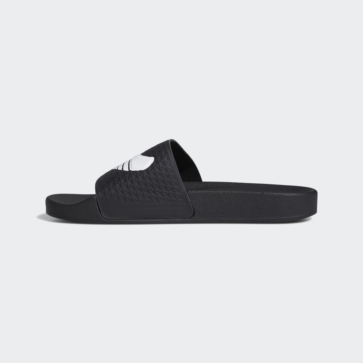 Adidas Shmoofoil Slides. 7