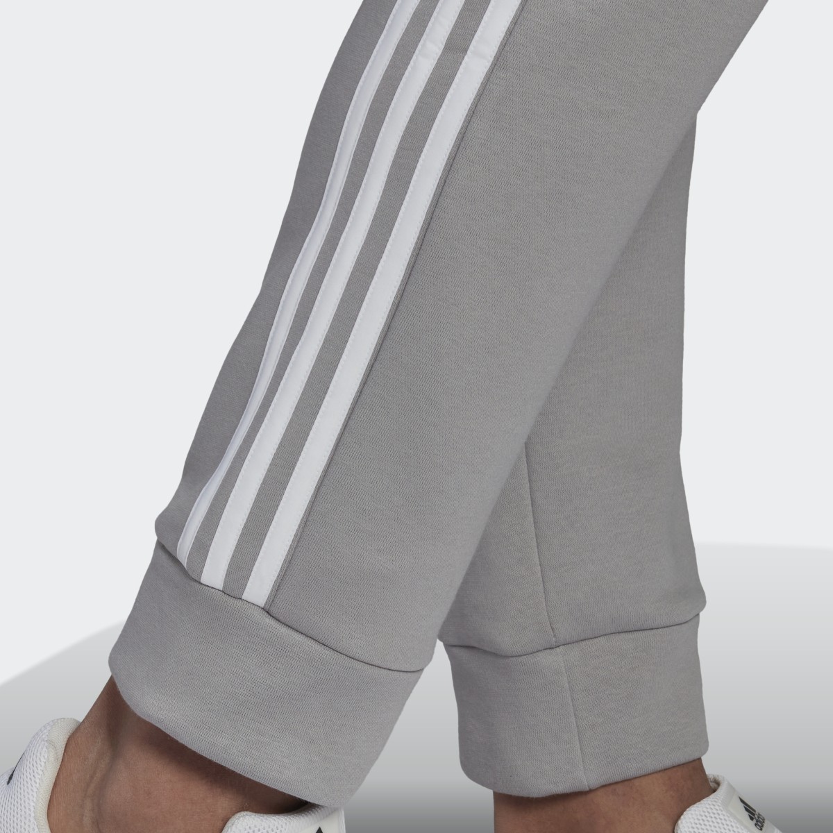 Adidas Calças em Fleece Essentials. 6