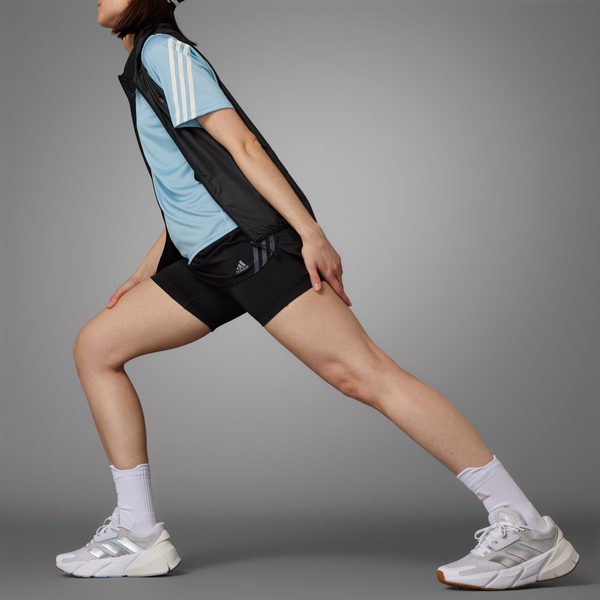 Adidas Jupe-short de running Run Icons 3 bandes. 8