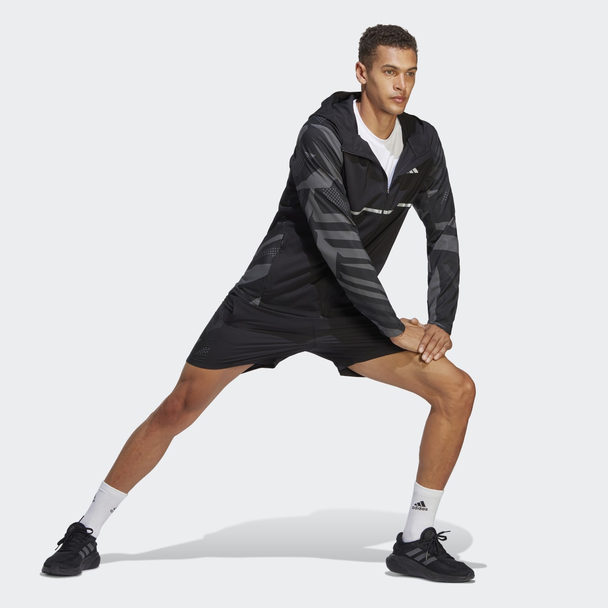 Adidas Own the Run Seasonal Jacket. 4