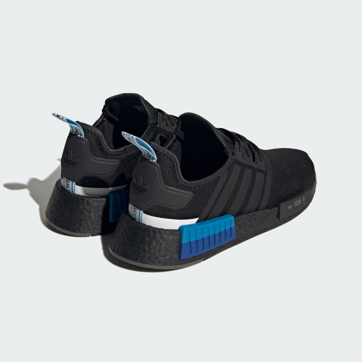 Adidas Tenis NMD_R1. 6