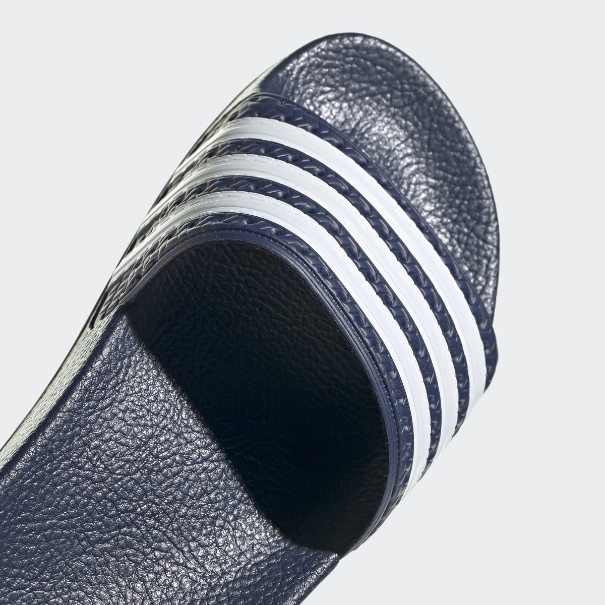 Adidas adilette Slides. 11