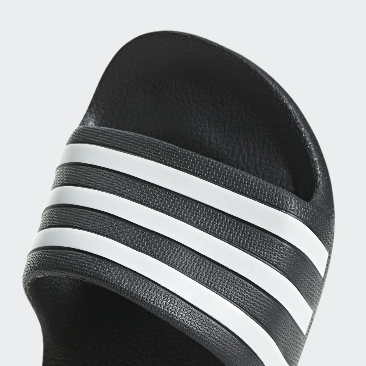 Adidas Chancla Adilette Aqua (Niños). 10