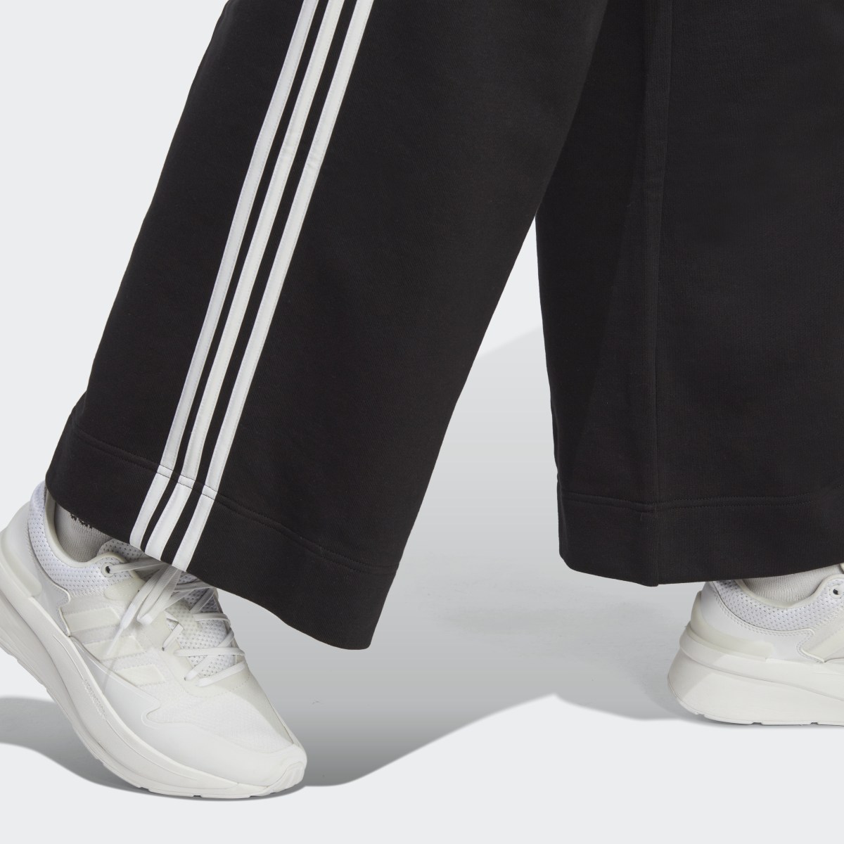 Adidas Essentials 3-Streifen French Terry Wide Hose. 6
