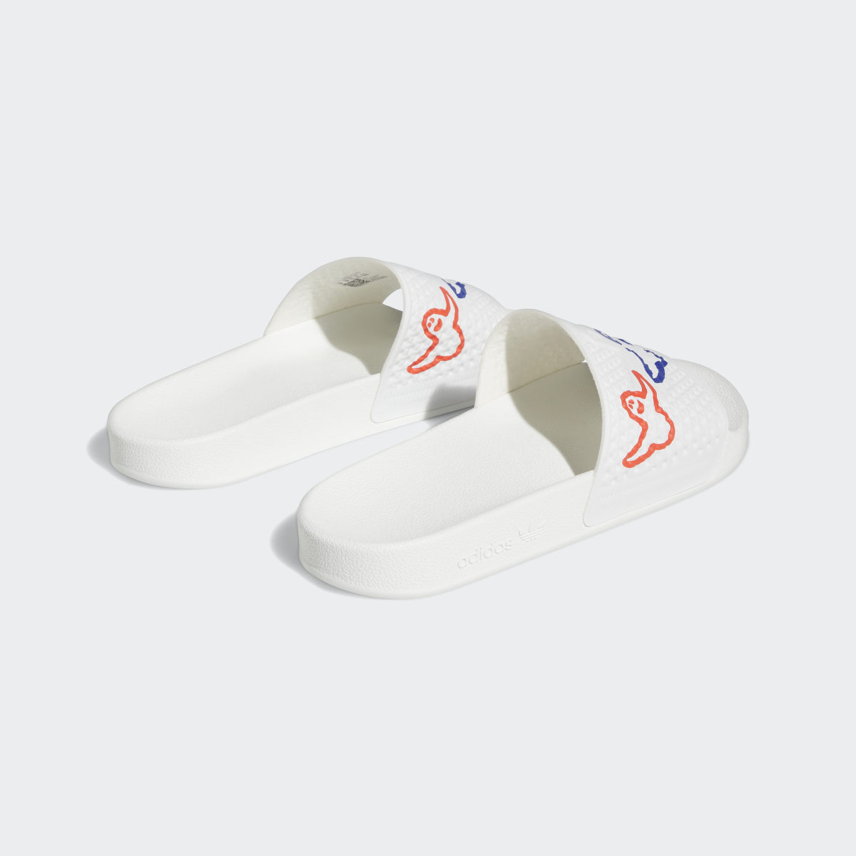 Adidas Shmoofoil Slides. 6