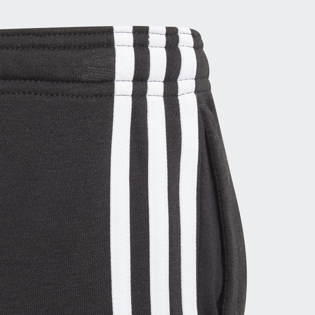 Adidas Essentials 3-Stripes Joggers. 4
