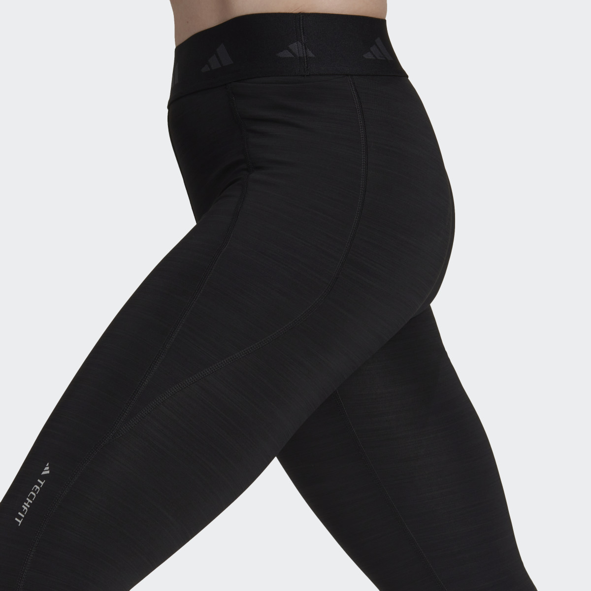 Adidas Legging long brossé Techfit. 5