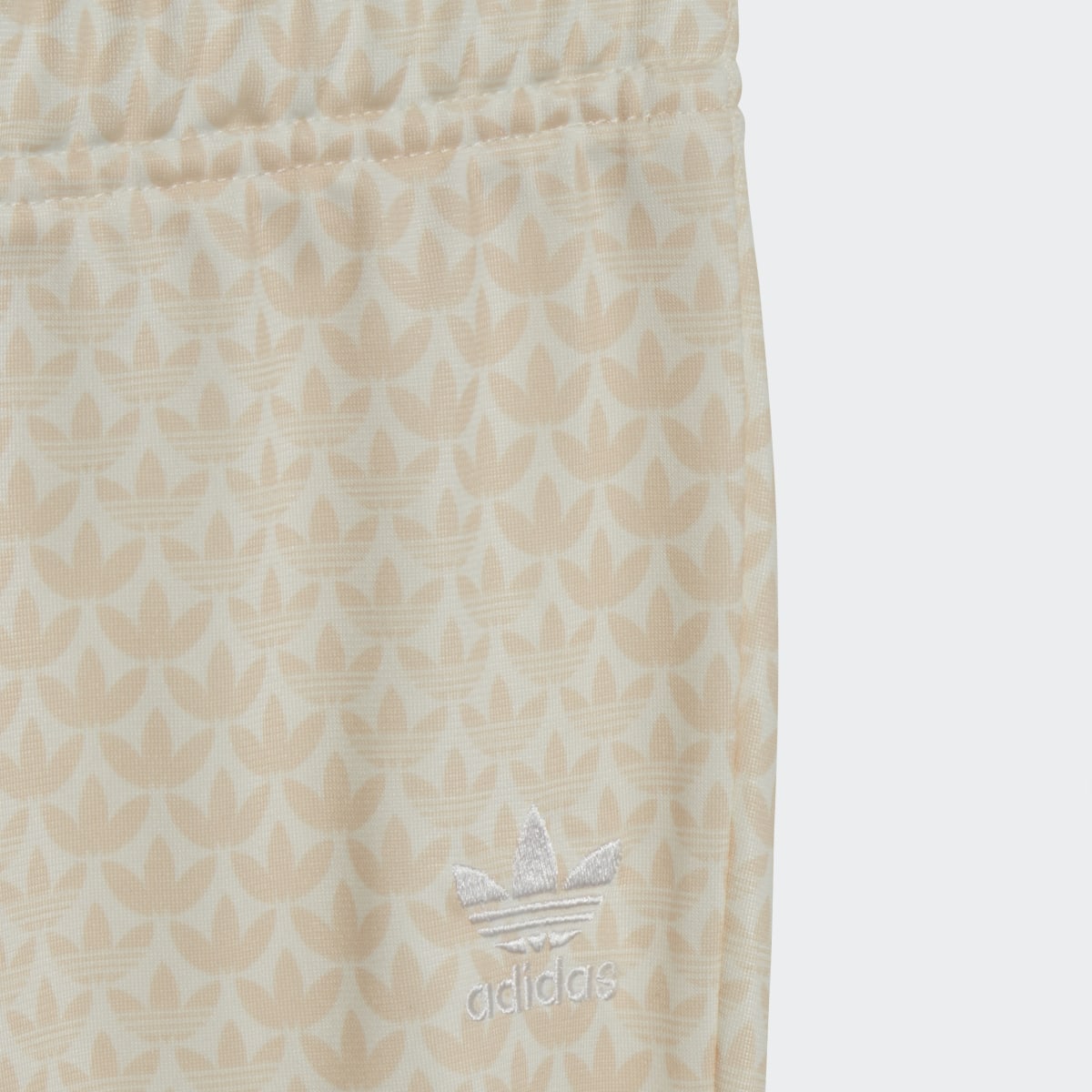 Adidas Monogram Print Track Suit. 9