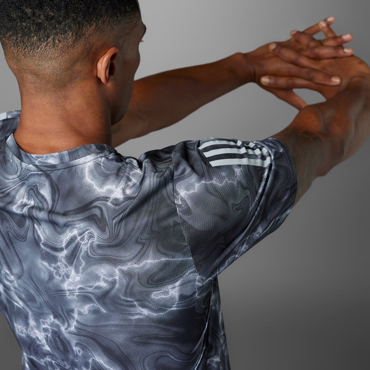 Adidas Own the Run Allover Print Tee. 5