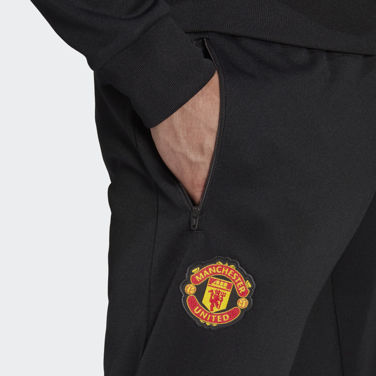 Adidas Manchester United Essentials Trefoil Joggers. 5