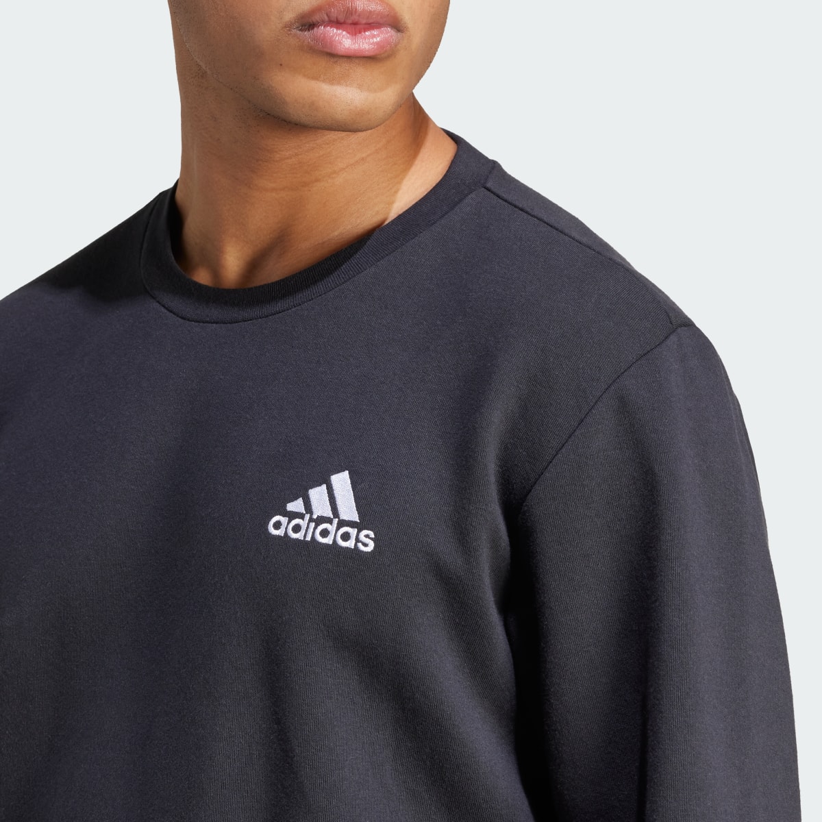 Adidas Essentials Fleece Sweatshirt. 7