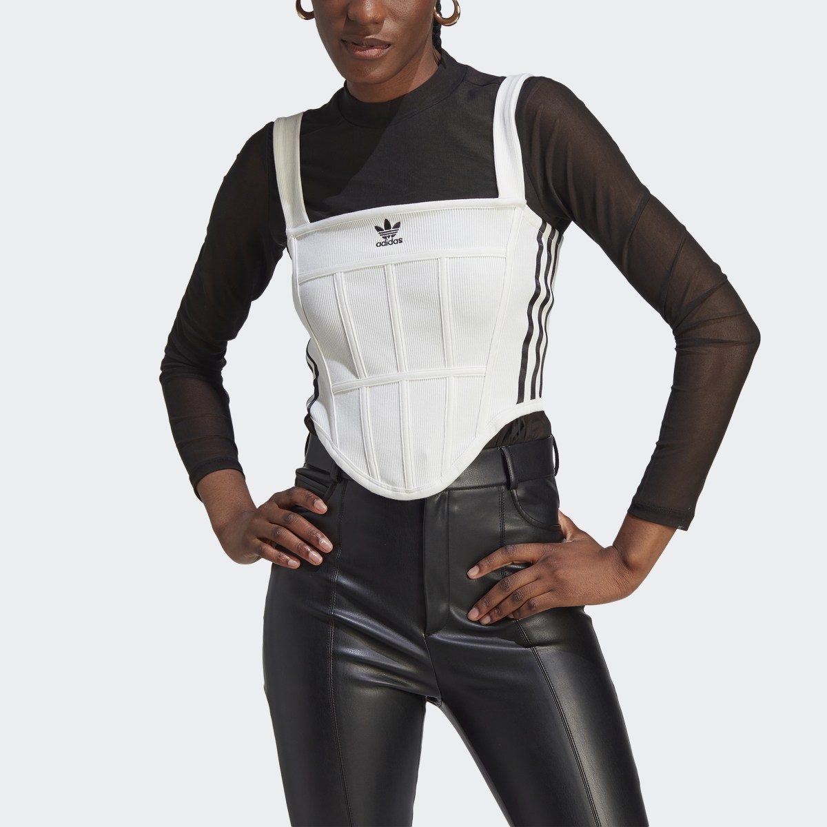 https://assets.adidas.com/images/w_1200,h_1200,f_auto,q_auto:sensitive/f49458aecbbf493fbec6afc200adae38_9366/rib-corset-tank-top.jpg