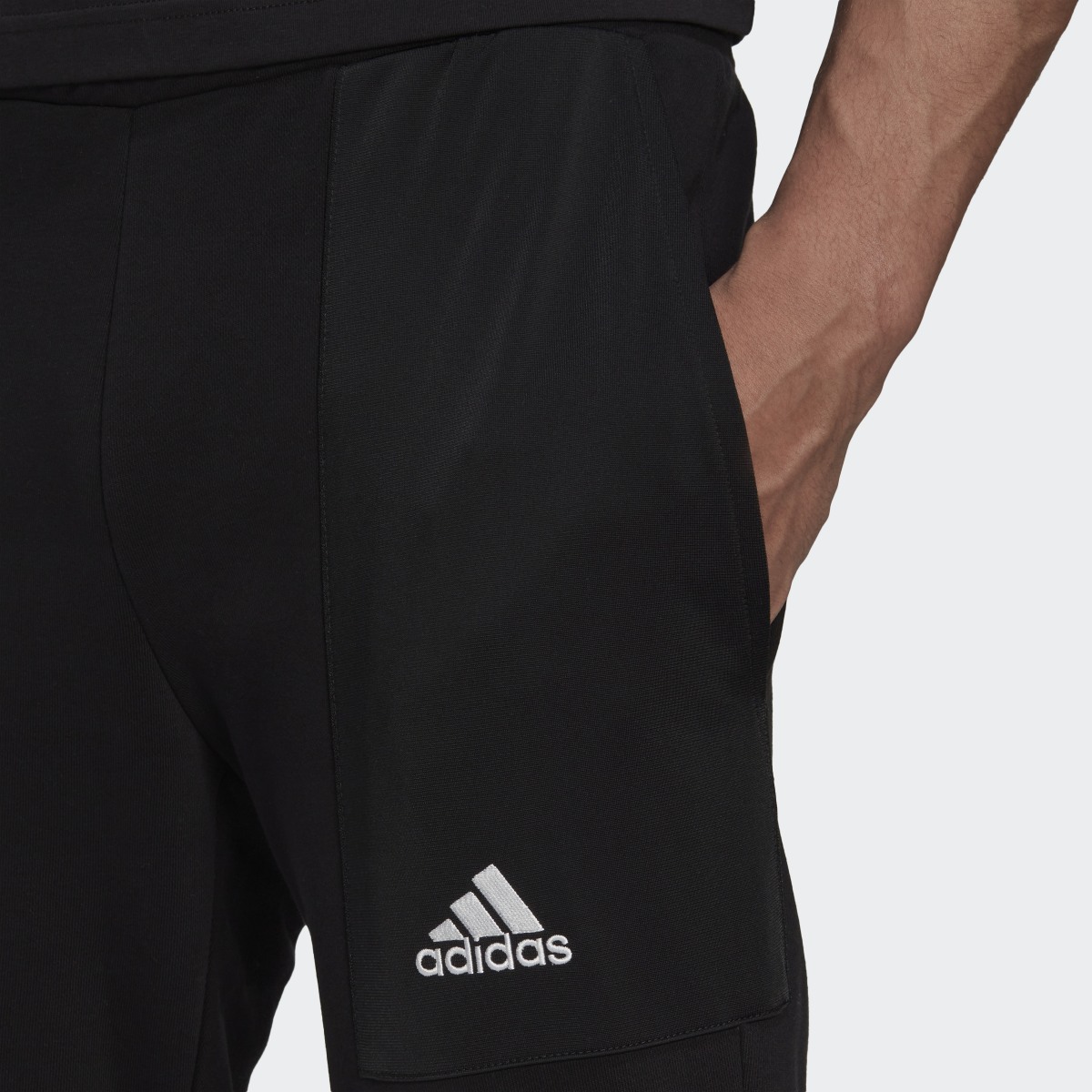 Adidas Essentials BrandLove French Terry Hose. 6