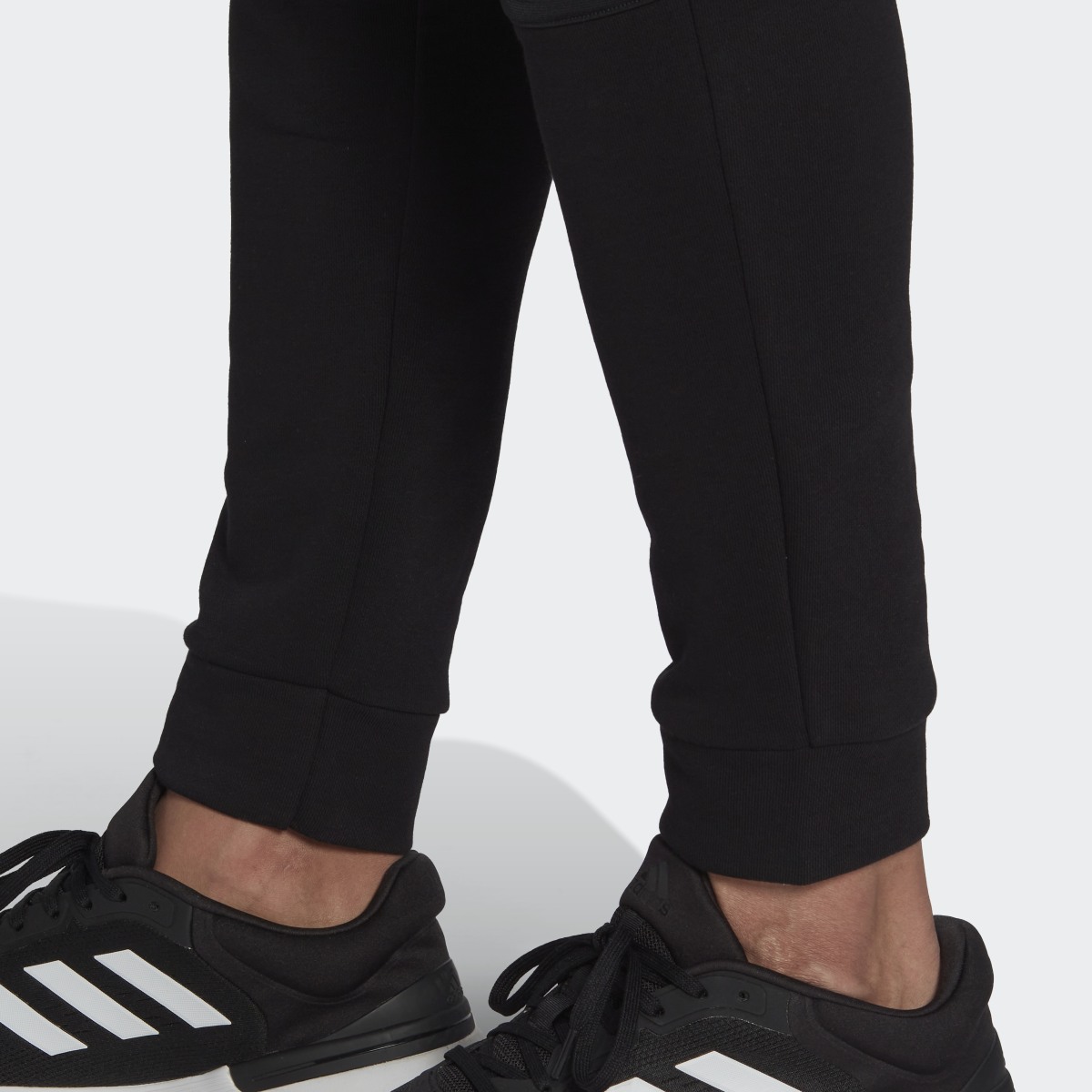 Adidas Essentials BrandLove French Terry Pants. 8