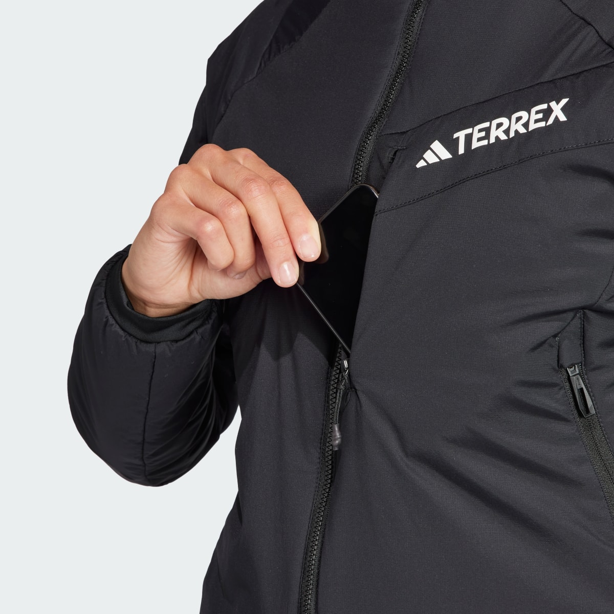 Adidas Chaqueta con capucha Terrex Techrock Stretch PrimaLoft®. 14