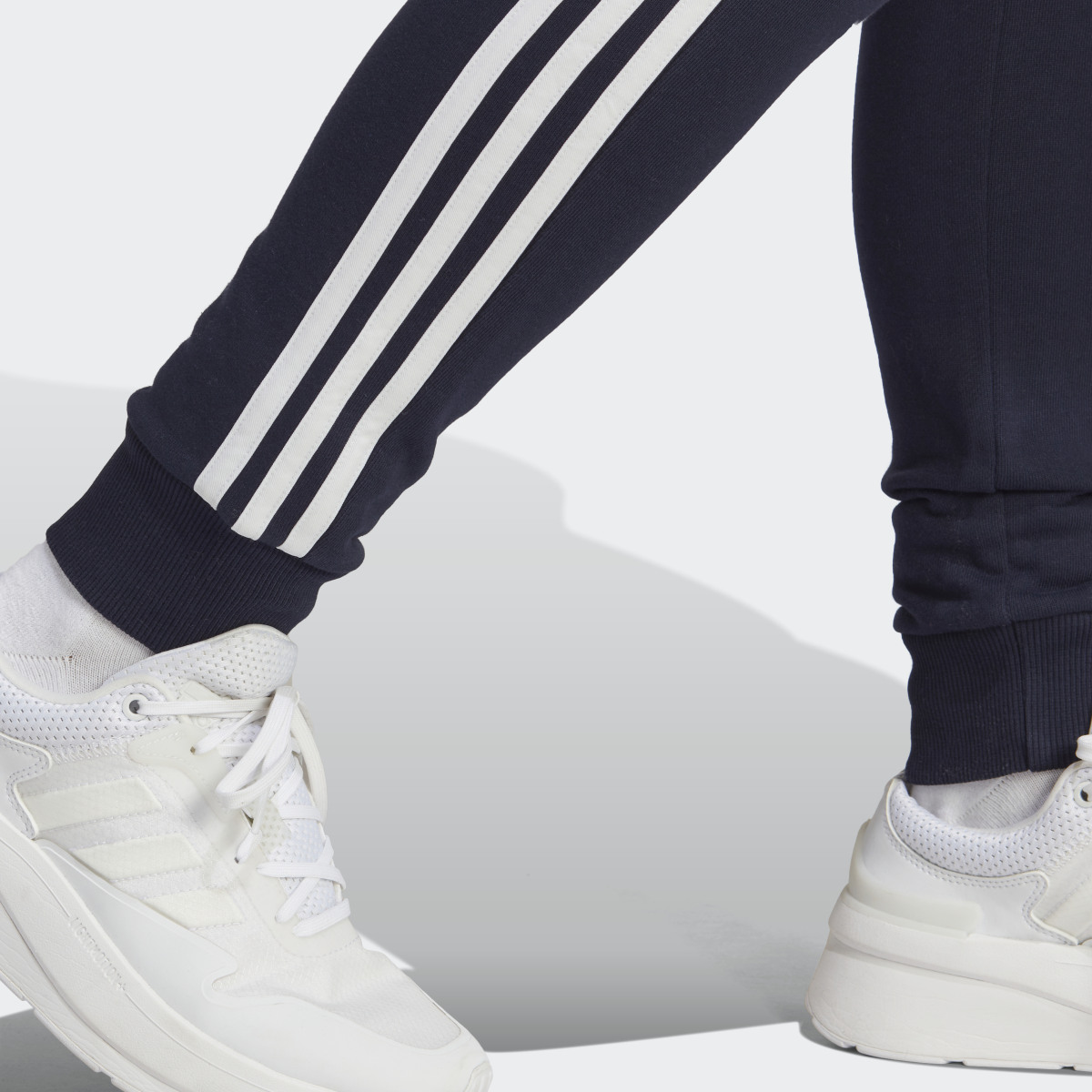 Adidas Essentials 3-Stripes French Terry Cuffed Joggers. 6