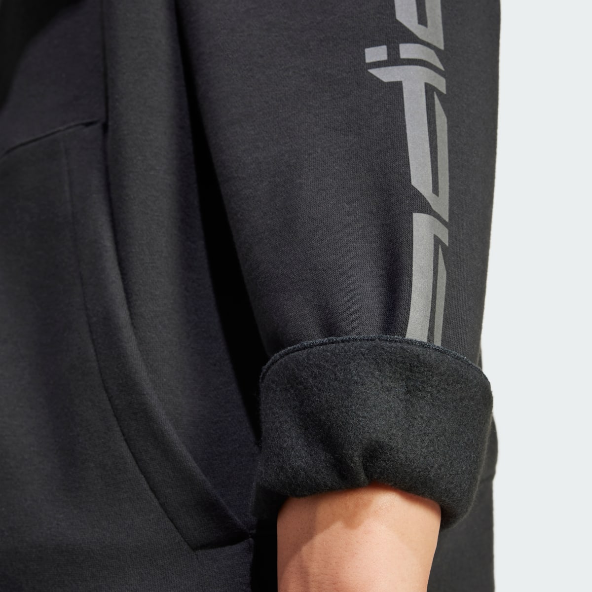 Adidas Sweat-shirt à capuche graphique. 6