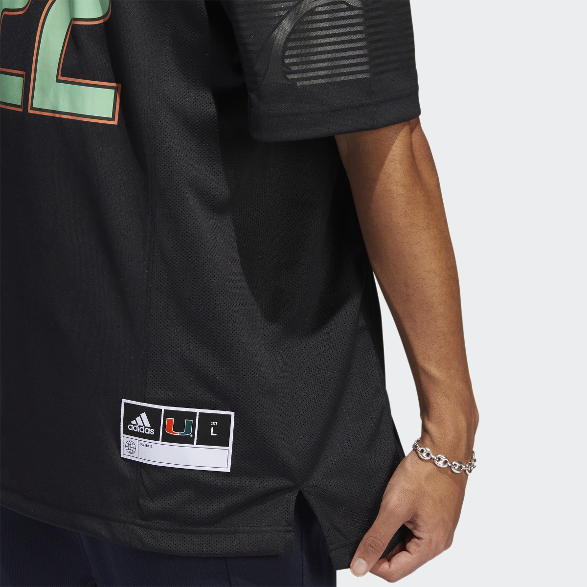 Adidas University of Miami ‘Miami Nights’ Jersey. 7