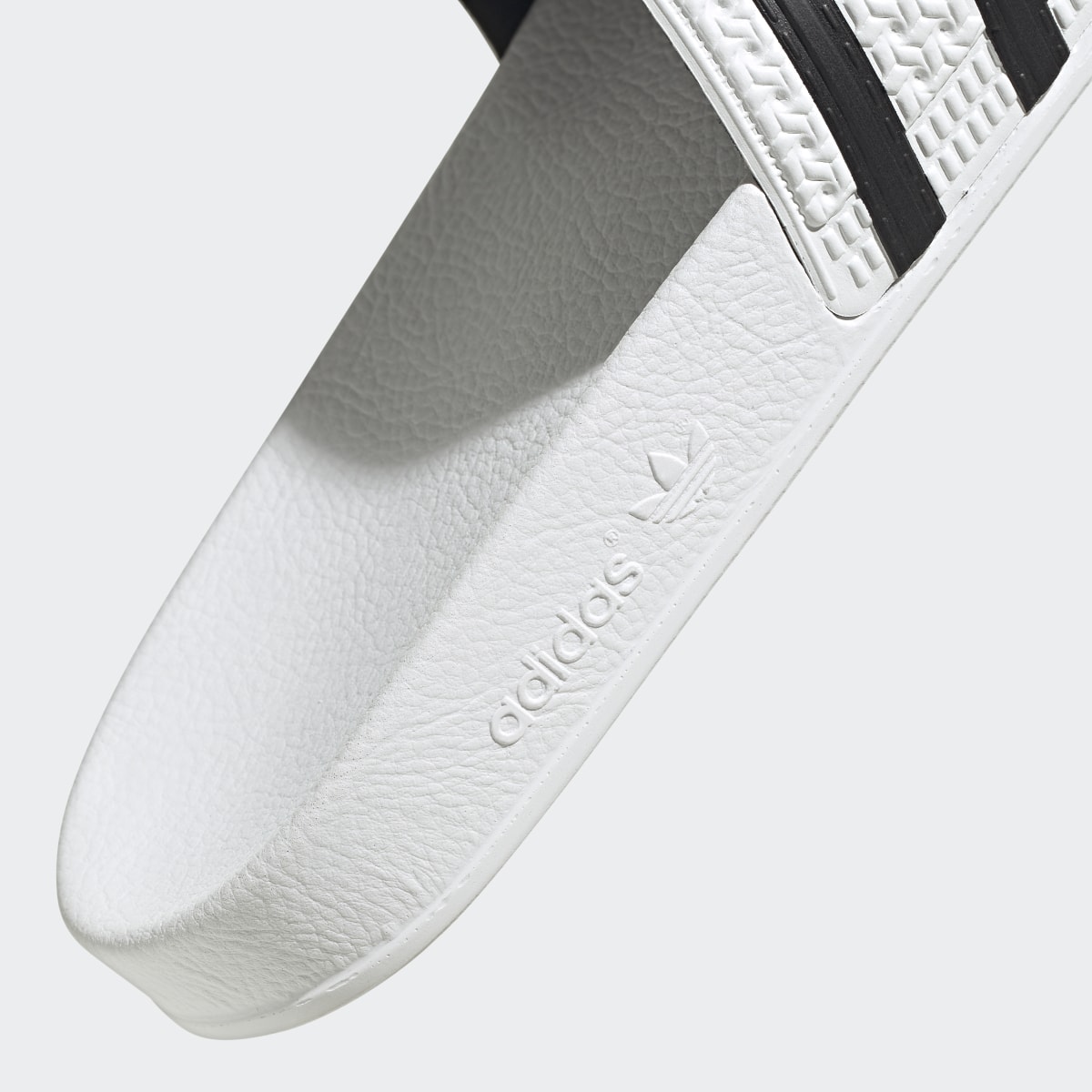 Adidas Claquette adilette. 10