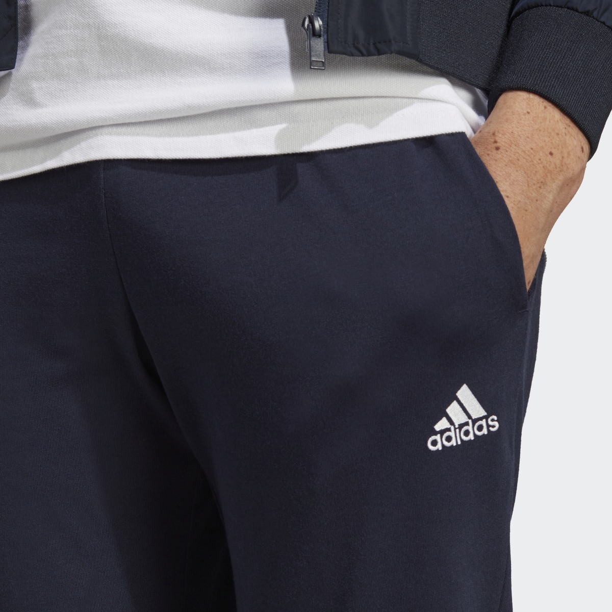 Adidas Essentials Single Jersey Tapered Elasticized Cuff Logo Hose. 5